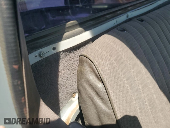 1990 Nissan Frontier with VIN 1N6SD11S9LC321876, listed as a Copart auction lot 59913575 with 119,909 mi miles and Salvage title. Bid and sale history available at DreamBid. Image 10.