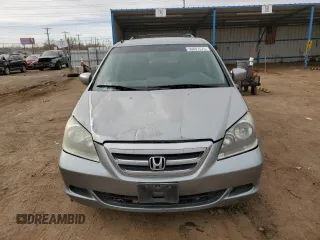 2005 Honda Odyssey EX-L with VIN 5FNRL38715B116530, listed as a Copart auction lot 50807575 with 216,434 mi miles and Salvage Title. Bid and sale history available at DreamBid. Image 5.