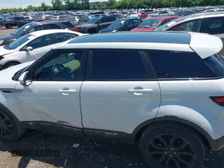 2015 Land Rover Range Rover Evoque Pure Premium z VIN SALVR2BG2FH075464, wystawiony jako IAAI lot #42268278 z przebiegiem 135 426 mil mil oraz . Historia ofert i sprzedaży dostępna na DreamBid. Obrazek 15.