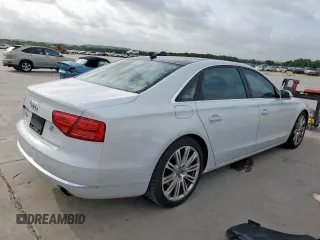 2014 Audi A8 3.0T with VIN WAURGAFD1EN013057, listed as a Copart auction lot 61161595 with 103,560 mi miles and Salvage title. Bid and sale history available at DreamBid. Image 3.