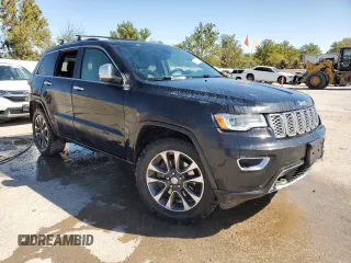 2017 Jeep Grand Cherokee Overland with VIN 1C4RJFCTXHC778491, listed as a Copart auction lot 73944594 with 99,235 mi miles and Clean Title. Bid and sale history available at carsss.com. Image 4.