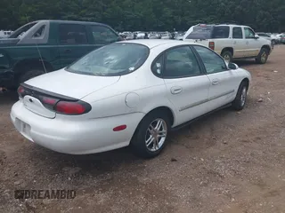 1999 Ford Taurus SE with VIN 1FAFP53U3XG245724, listed as a IAAI auction lot 42638558 with 134,764 mi miles and . Bid and sale history available at DreamBid. Image 4.