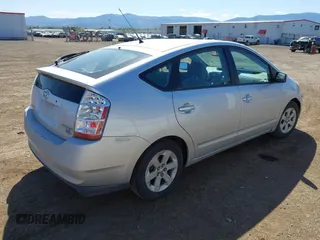 2007 Toyota Prius with VIN JTDKB20U677611878, listed as a IAAI auction lot 42233105 with 291,499 mi miles and . Bid and sale history available at DreamBid. Image 4.
