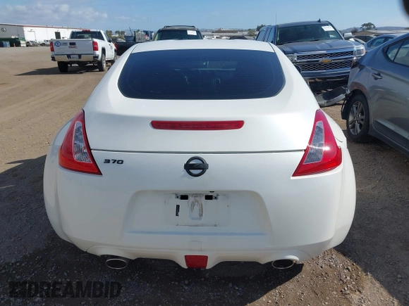 2016 Nissan 370Z Sport z VIN JN1AZ4EH9GM931683, wystawiony jako IAAI lot #42000779 z przebiegiem 113 919 mil mil oraz . Historia ofert i sprzedaży dostępna na DreamBid. Obrazek 16.