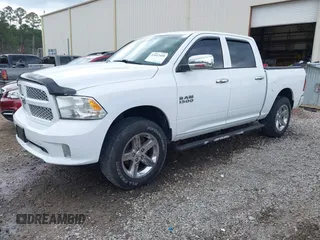 2015 Ram 1500 Tradesman with VIN 1C6RR7KG8FS648142, listed as a IAAI auction lot 41647459 with 100,696 mi miles and . Bid and sale history available at DreamBid. Image 2.