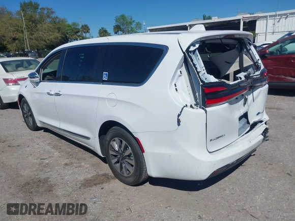 2022 Chrysler Pacifica Hybrid Limited with VIN 2C4RC1S74NR112960, listed as a IAAI auction lot 41584818 with 22,040 mi miles and . Bid and sale history available at DreamBid. Image 3.
