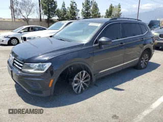2018 Volkswagen Tiguan SEL z VIN 3VV3B7AX8JM053749, wystawiony jako Copart lot #59393595 z przebiegiem 123 577 mil mil oraz Czysty tytuł • Clean title. Historia ofert i sprzedaży dostępna na DreamBid. Obrazek 1.