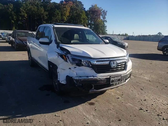 2020 Honda Ridgeline RTL-E with VIN 5FPYK3F77LB002473, listed as a Copart auction lot 77117414 with 62,631 mi miles and Salvage Title. Bid and sale history available at carsss.com. Image 10.
