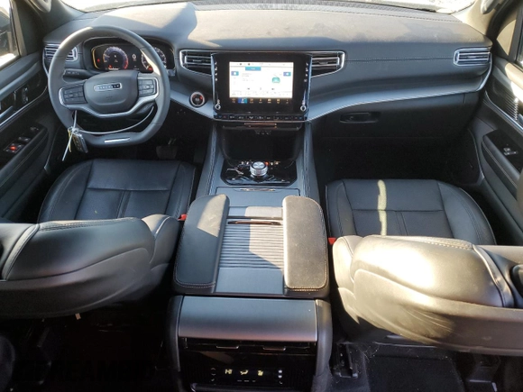 2024 Jeep Wagoneer Series II Carbide with VIN 1C4SJSBP8RS103079, listed as a Copart auction lot 47974685 with 15,990 mi miles and Salvage Title. Bid and sale history available at DreamBid. Image 8.