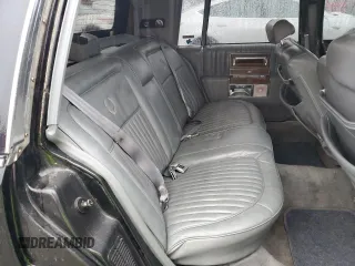 1989 Cadillac Brougham z VIN 1G6DW51Y9KR725809, wystawiony jako Copart lot #80902764 z przebiegiem 56 033 mil mil oraz Szkody całkowita. Historia ofert i sprzedaży dostępna na DreamBid. Obrazek 10.