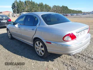 2004 Jaguar X-Type with VIN SAJEA51C94WD62540, listed as a IAAI auction lot 41864020 with 85,713 mi miles. Bid and sale history available at carsss.com. Image 3.