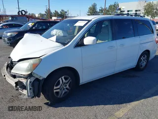2006 Honda Odyssey EX z VIN 5FNRL38486B410286, wystawiony jako IAAI lot #41641433 z przebiegiem 145 312 mil mil oraz . Historia ofert i sprzedaży dostępna na DreamBid. Obrazek 17.