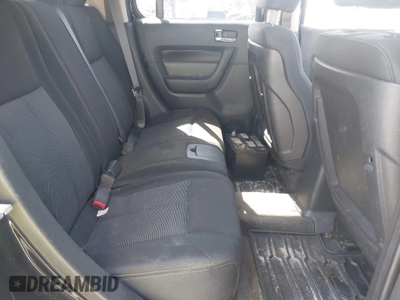 2007 Hummer H3 SUV with VIN 5GTDN13E878233953, listed as a IAAI auction lot 42012596 with 232,919 mi miles. Bid and sale history available at carsss.com. Image 8.