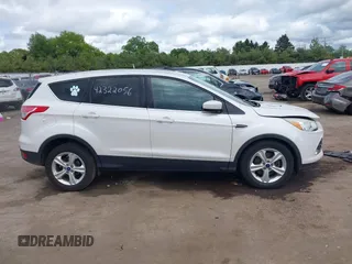 2016 Ford Escape SE z VIN 1FMCU9GX3GUB85250, wystawiony jako IAAI lot #42322056 z przebiegiem 187 833 mil mil oraz . Historia ofert i sprzedaży dostępna na DreamBid. Obrazek 13.