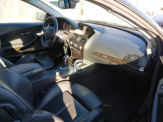 2008 BMW 6 Series 650i with VIN WBAEA53538CV90709, listed as a IAAI auction lot 41678425 with 104,825 mi miles. Bid and sale history available at carsss.com. Image 5.