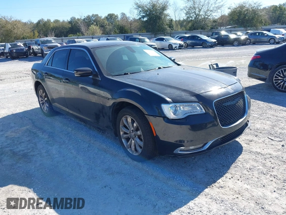 2015 Chrysler 300 Limited with VIN 2C3CCARG9FH838420, listed as a IAAI auction lot 41684228 with 242,316 mi miles. Bid and sale history available at carsss.com. Image 1.