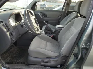 2005 Ford Escape Hybrid with VIN 1FMCU96HX5KC53207, listed as a Copart auction lot 79318904 with 147,008 mi miles and Salvage Title. Bid and sale history available at carsss.com. Image 7.