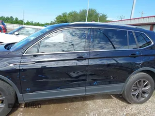 2023 Volkswagen Tiguan SE with VIN 3VV3B7AX6PM120292, listed as a IAAI auction lot 42231082 with 24,045 mi miles and . Bid and sale history available at DreamBid. Image 6.