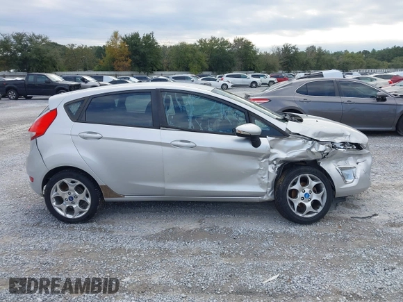 2011 Ford Fiesta SES with VIN 3FADP4FJ5BM232264, listed as a IAAI auction lot 40982622 with 184,726 mi miles. Bid and sale history available at carsss.com. Image 13.