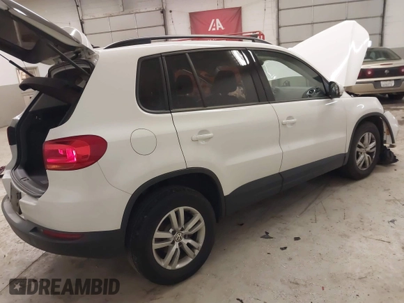2017 Volkswagen Tiguan S with VIN WVGBV7AX6HK012650, listed as a IAAI auction lot 41135475 with 96,198 mi miles and . Bid and sale history available at DreamBid. Image 4.
