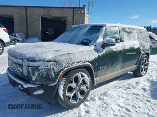 2024 Rivian R1S Adventure with VIN 7PDSGBBA9RN042780, listed as a IAAI auction lot 41440424 with 10,747 mi miles. Bid and sale history available at carsss.com. Image 20.