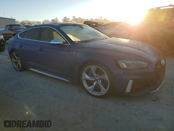 2021 Audi RS 5 Sportback z VIN WUAAWCF51MA901341, wystawiony jako Copart lot #76619034 z przebiegiem Nie podano mil oraz Szkoda całkowita • Salvage title. Historia ofert i sprzedaży dostępna na DreamBid. Obrazek 4.