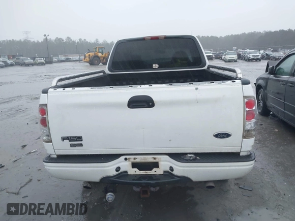 1999 Ford F-150 XL with VIN 1FTRX18L6XNB48352, listed as a IAAI auction lot 41717057 with 171,654 mi miles. Bid and sale history available at carsss.com. Image 17.
