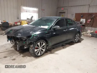 2016 Kia Optima SX Turbo with VIN 5XXGW4L27GG106780, listed as a IAAI auction lot 41586007 with 114,756 mi miles and . Bid and sale history available at carsss.com. Image 18.