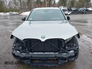 2020 BMW X3 M with VIN 5YMTS0C02L9B29984, listed as a IAAI auction lot 41655102 with 38,878 mi miles. Bid and sale history available at carsss.com. Image 13.