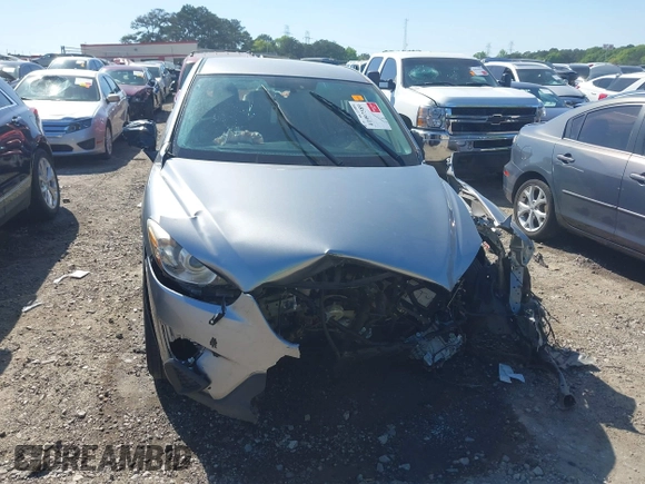 2013 Mazda CX-5 Sport z VIN JM3KE2BE9D0132928, wystawiony jako IAAI lot #41997589 z przebiegiem Nie podano mil oraz . Historia ofert i sprzedaży dostępna na DreamBid. Obrazek 11.