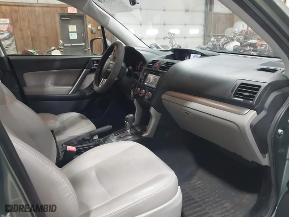 2014 Subaru Forester 2.5i Limited with VIN JF2SJAJC7EH512790, listed as a IAAI auction lot 42097522 with 112,419 mi miles. Bid and sale history available at carsss.com. Image 5.
