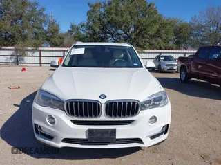2014 BMW X5 sDrive35i with VIN 5UXKR2C53E0C01692, listed as a IAAI auction lot 41727216 with 135,985 mi miles. Bid and sale history available at carsss.com. Image 12.