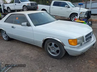1990 Mercedes-Benz 560 with VIN WDBCA45E9LA549067, listed as a IAAI auction lot 41849642 with 124,516 mi miles and . Bid and sale history available at DreamBid. Image 1.