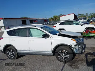 2016 Toyota RAV4 LE with VIN 2T3ZFREV0GW243456, listed as a IAAI auction lot 41962345 with 62,381 mi miles. Bid and sale history available at carsss.com. Image 14.