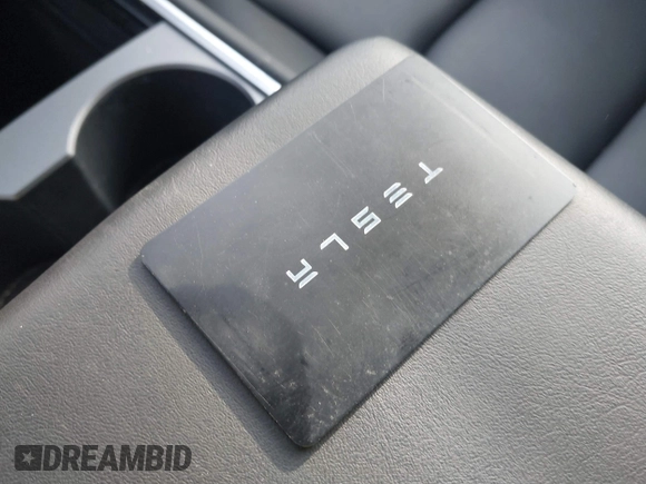 2023 Tesla Model Y Long Range with VIN 7SAYGAEEXPF612231, listed as a IAAI auction lot 41758243 with 32,924 mi miles and . Bid and sale history available at DreamBid. Image 11.