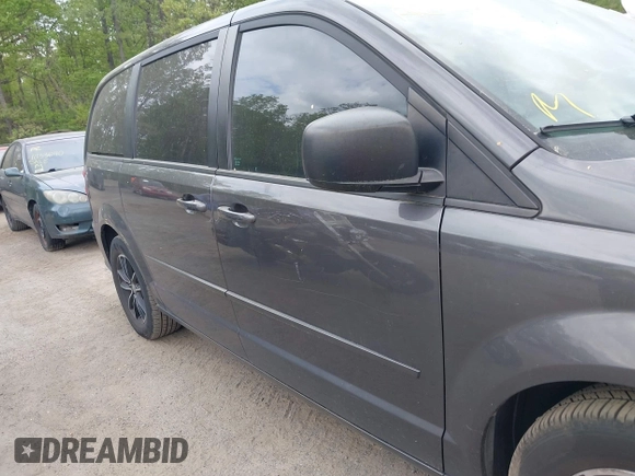 2015 Dodge Grand Caravan American Value with VIN 2C4RDGBG2FR542844, listed as a IAAI auction lot 42109983 with 129,718 mi miles and . Bid and sale history available at DreamBid. Image 13.