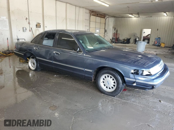 1997 Ford Crown Victoria LX с VIN 2FALP74W2VX109574, выставлен на аукционе Copart как лот 56222925 с пробегом 175 901 миль миль и Списание • Salvage title. История ставок и продаж доступна на DreamBid. Изображение 4.