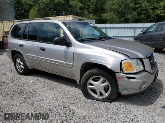 2004 GMC Envoy SLE with VIN 1GKDS13S942119615, listed as a Copart auction lot 69653494 with 141,856 mi miles and Salvage Title. Bid and sale history available at carsss.com. Image 4.