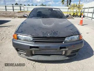 1990 Nissan Skyline z VIN BNR32010431, wystawiony jako Copart lot #78496994 z przebiegiem 182 401 mil mil oraz Nie do naprawy • Non repairable. Historia ofert i sprzedaży dostępna na DreamBid. Obrazek 5.