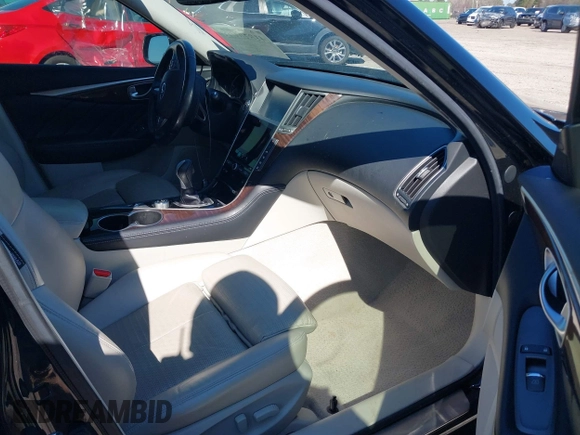 2014 Infiniti Q50 Premium z VIN JN1BV7AP4EM680924, wystawiony jako IAAI lot #41820183 z przebiegiem 125 455 mil mil oraz . Historia ofert i sprzedaży dostępna na DreamBid. Obrazek 5.