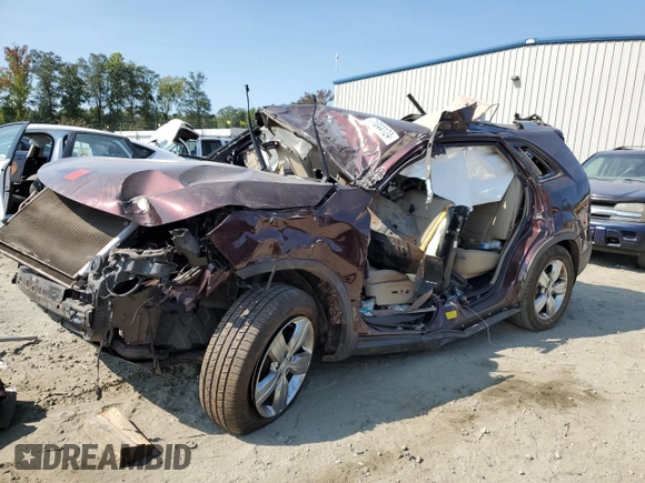 2012 Kia Sorento EX with VIN 5XYKU4A62CG222061, listed as a Copart auction lot 71044124 with 218,770 mi miles and Salvage Title. Bid and sale history available at carsss.com. Image 1.
