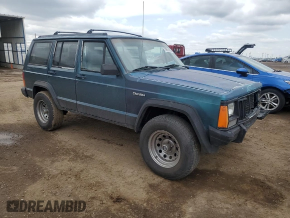 1996 Jeep Cherokee Sport with VIN 1J4FJ68S3TL251074, listed as a Copart auction lot 59593955 with 181,482 mi miles and Salvage title. Bid and sale history available at DreamBid. Image 4.