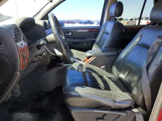 2006 GMC Envoy SLE z VIN 1GKDT13S262210046, wystawiony jako Copart lot #49335595 z przebiegiem 292 940 mil mil oraz Szkoda całkowita • Salvage title. Historia ofert i sprzedaży dostępna na DreamBid. Obrazek 7.
