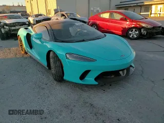 2023 McLaren GT z VIN SBM22GCA0PW002765, wystawiony jako Copart lot #78866364 z przebiegiem Nie podano mil oraz Szkody całkowita. Historia ofert i sprzedaży dostępna na DreamBid. Obrazek 11.