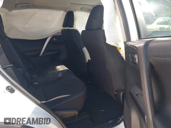 2017 Toyota RAV4 XLE with VIN JTMWFREV9HJ128521, listed as a IAAI auction lot 41658054 with 106,788 mi miles and . Bid and sale history available at DreamBid. Image 8.