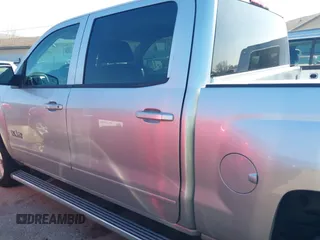 2015 Chevrolet Silverado 1500 LT with VIN 3GCPCREH0FG152809, listed as a IAAI auction lot 41573835 with 213,410 mi miles and . Bid and sale history available at DreamBid. Image 14.
