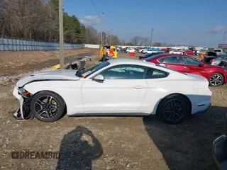 2019 Ford Mustang EcoBoost with VIN 1FA6P8TH7K5151242, listed as a IAAI auction lot 41530579 with 91,002 mi miles and . Bid and sale history available at carsss.com. Image 14.