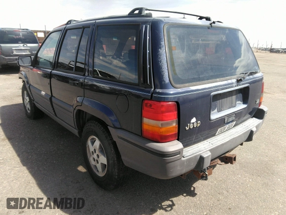 1994 Jeep Grand Cherokee Laredo with VIN 1J4GZ58Y3RC202638, listed as a IAAI auction lot 41885484 with 164,481 mi miles. Bid and sale history available at carsss.com. Image 3.
