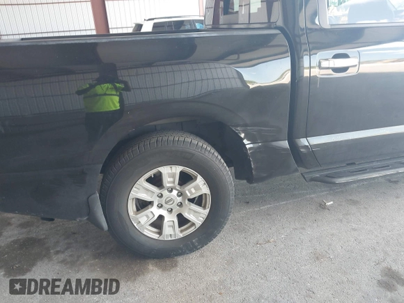 2018 Nissan Titan SV with VIN 1N6AA1E63JN512230, listed as a IAAI auction lot 42000705 with 64,479 mi miles and . Bid and sale history available at DreamBid. Image 6.