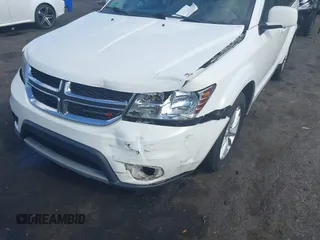 2015 Dodge Journey SXT with VIN 3C4PDCBG0FT653857, listed as a IAAI auction lot 42128410 with 182,960 mi miles and . Bid and sale history available at DreamBid. Image 6.